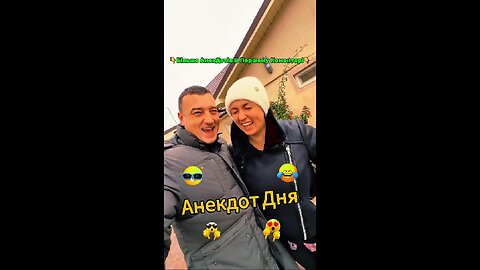 Red tomatoes and large cucumbers on a naked woman