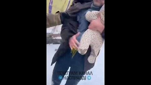 Abductors from the Ukrainian Zelensky regime abducting a man holding his little baby