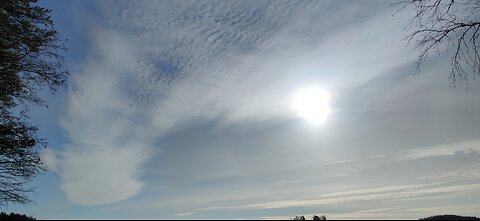 9.3.2025: Sun halo but something up there..another halo? Halo color, weird clouds, white trails