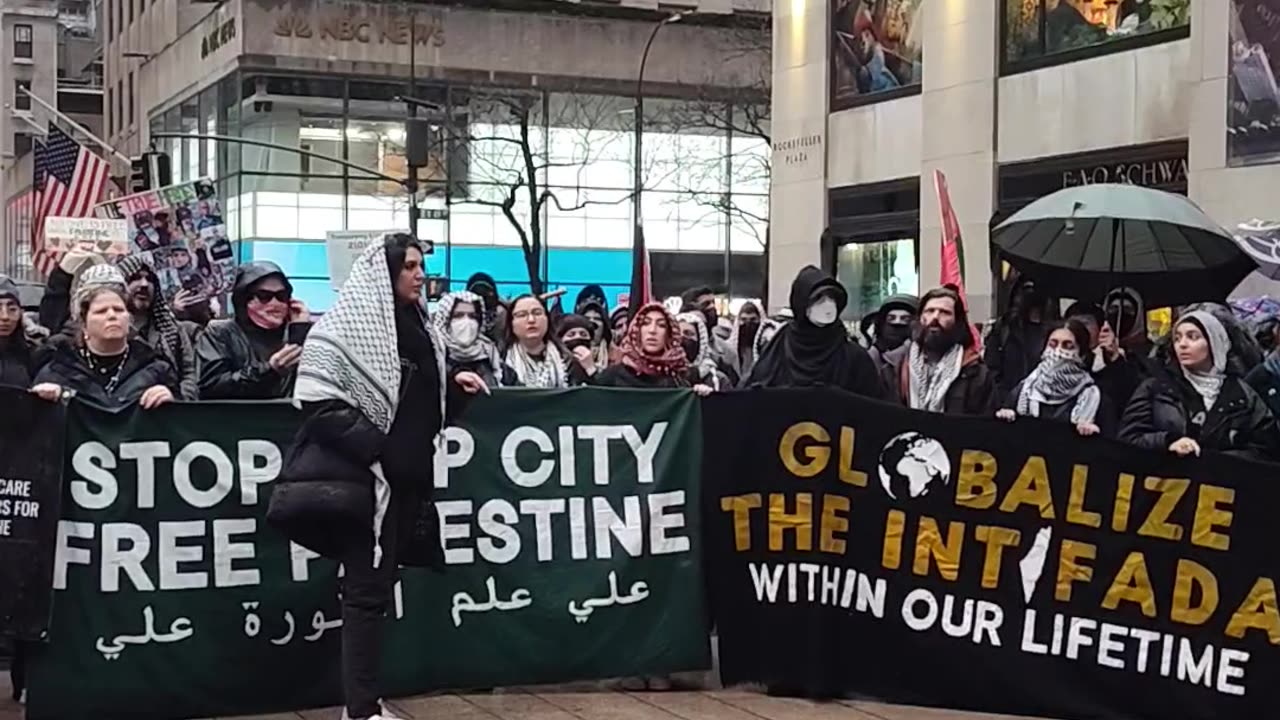 "FLOOD NEW YORK CITY FOR GAZA" in Rockefeller Center NYC 2of2