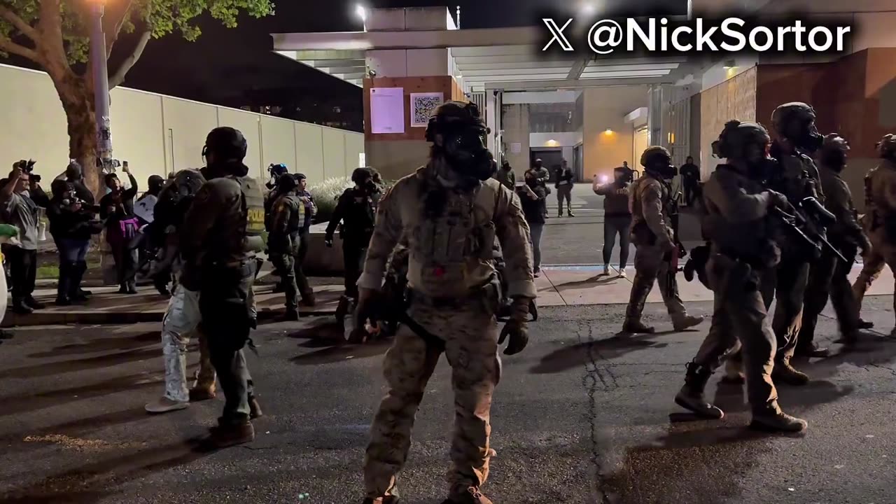 A degenerate leftist just jumped onto federal property at the Portland ICE facility and