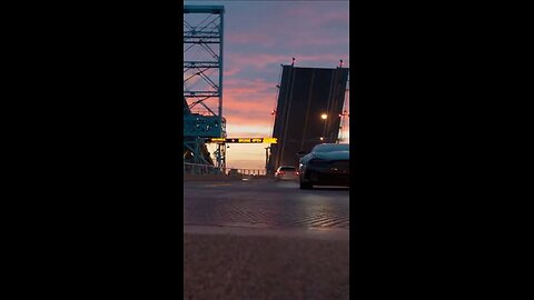 Man jumps bridge with car