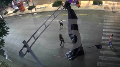 Skydiver crash-lands in Mexico City, gets caught on traffic light