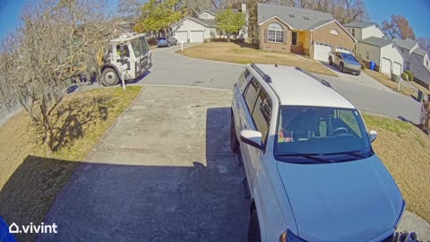 Garbage Truck Throws Away Trash Bin