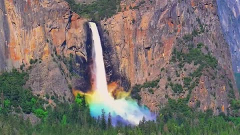 A Rainbow Waterfall… This Looks Unreal 🌈💧