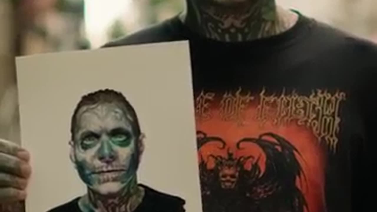 Interviewing and painting a man with a skull face tattoo