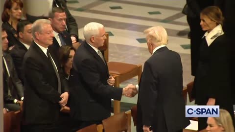 Trump and Mike Pence Shake Hands At Carter's Funeral Service