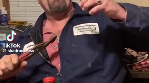 White man does his own dental work