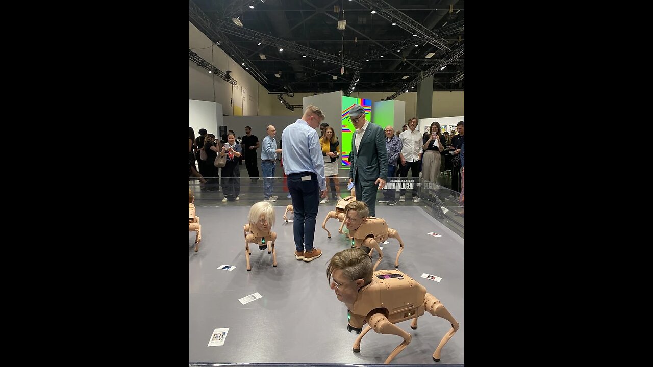 Beeple and Hans Ulrich Obrist in the arena where Regular Animals debuted for Art Basel #SHORT