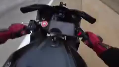 Lane-splitting biker clipped by BMW at 104 mph pulls off miracle save