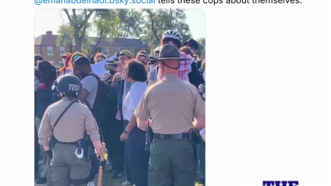 U. Chicago professor yells 'Shame!' at police outside ICE facility