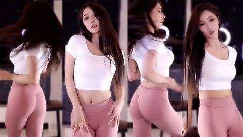 Pink yoga pants and a sporty top highlight her curves with bold, stunning energy