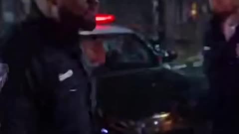 2 police officers fist fight each other