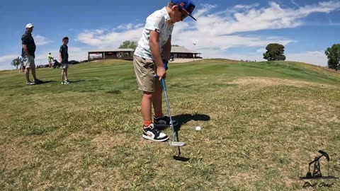 Young golfer swing and putt montage