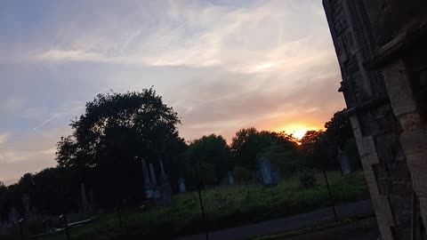 Sunset following a statue of liberty crown like cloud filling the sky.