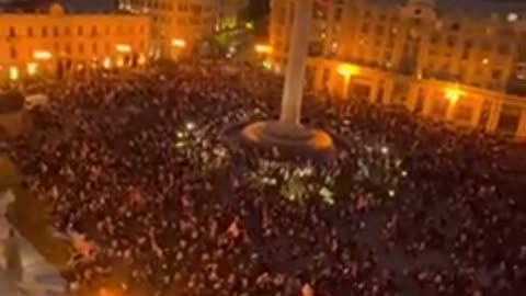 Protesters in Georgia have stormed the presidential palace, breaking through metal barricade