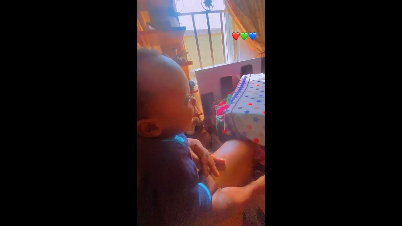 Watch this adorable baby playing with dad, check out his reaction. Too funny !