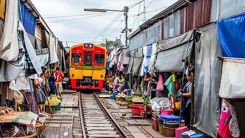 WORLD'S MOST DANGEROUS MARKET?! 🚂 Maeklong Train Market in Thailand