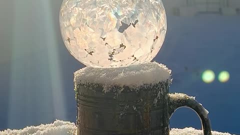 Soap Bubble Turns To Crystal Globe In Frigid Cold