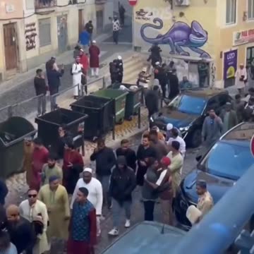 Lisbon is overrun by Muslims. There are no women in video. Dramatic situation.