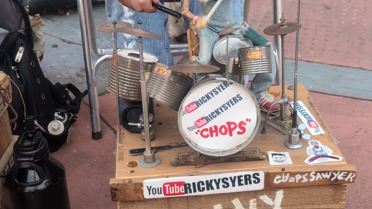 Puppeteer Playing Someone Playing the Drums