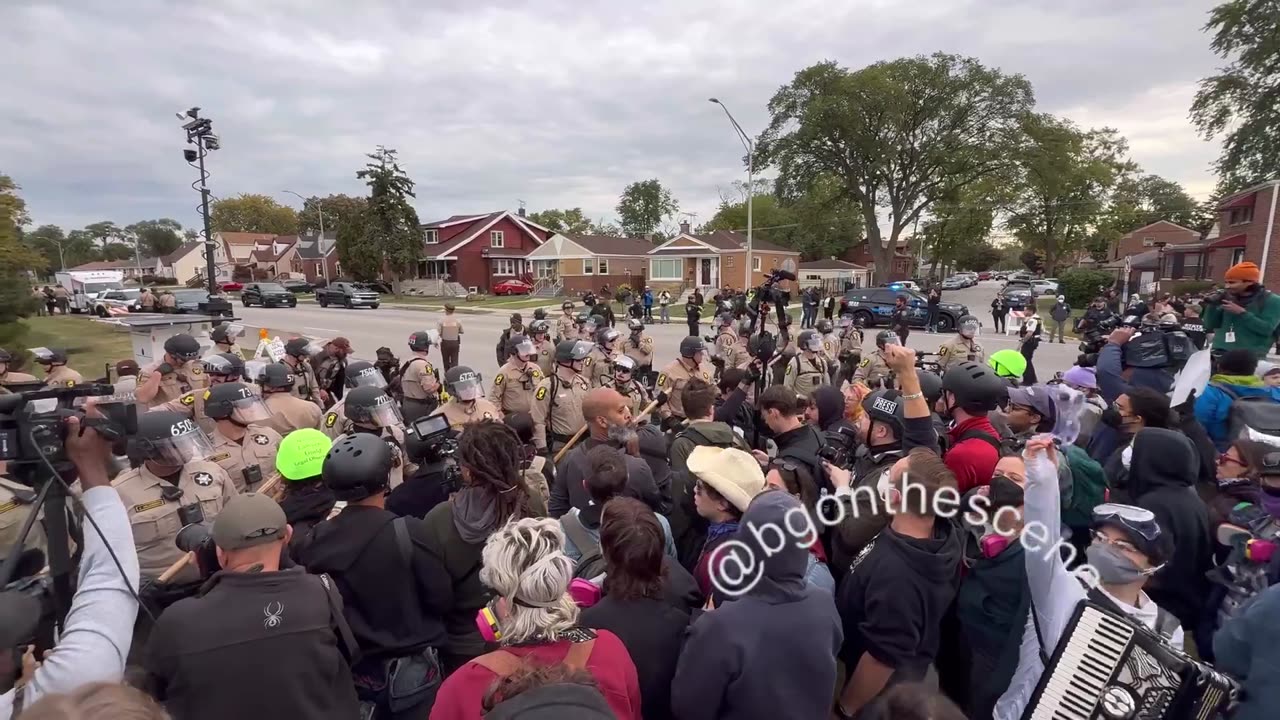 Arrestees are led away near the Broadview ICE facility