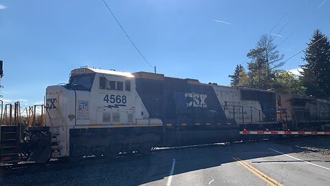 Nice CSX Train Consist with a YN2 119, Dash 8 9051, and Safety SD70MAC 4568