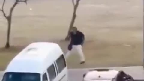 Bystander to Australia shooting takes gun from one of the gunmen.