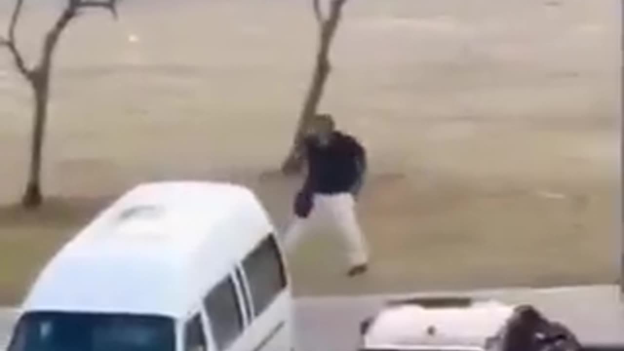 Bystander to Australia shooting takes gun from one of the gunmen.