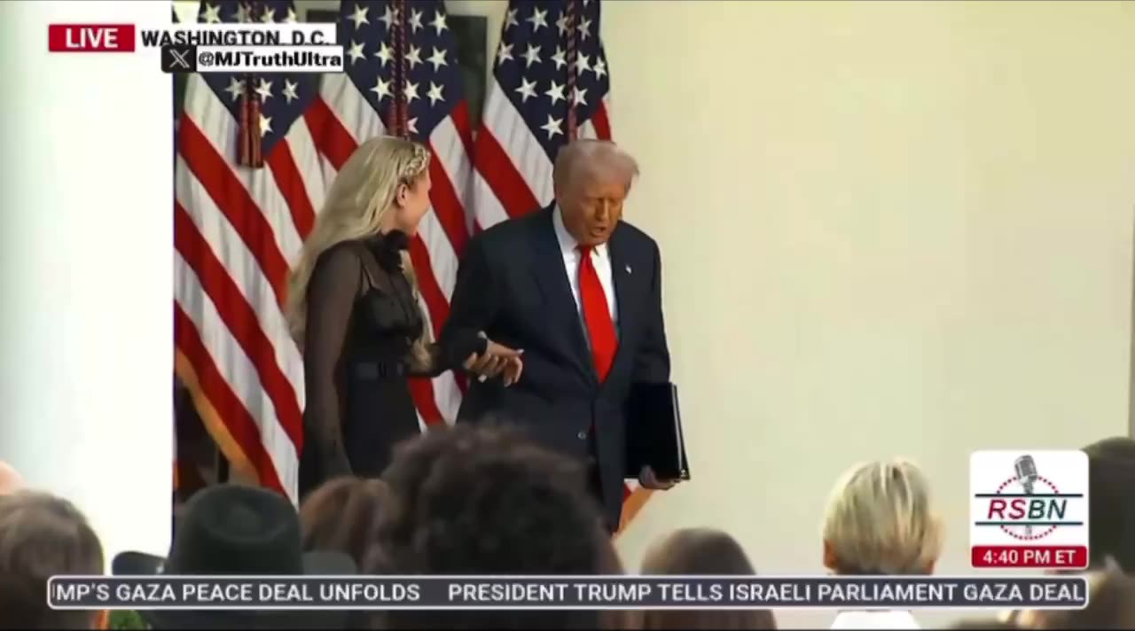 President Trump walks out with widow, Erika Kirk