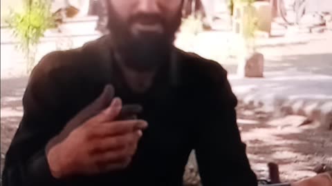 Taliban fighter practicing English