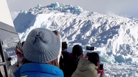 Huge iceberg turning