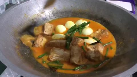 Second Step: Adding Eggs and Tofu to Long Bean Curry