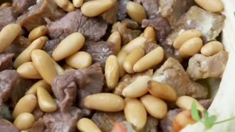 Hummus and meat with nuts