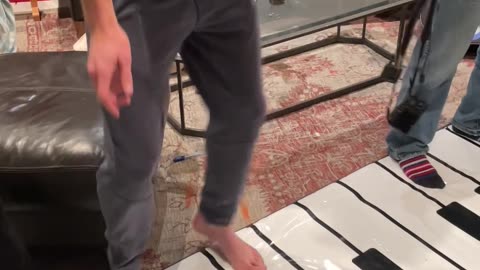 Musician Roommates Play Giant Floor Piano