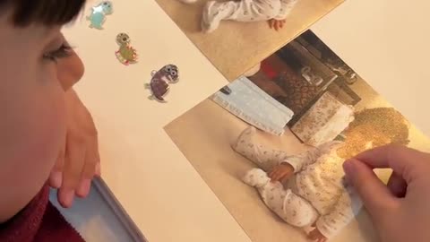 6-Year-Old Tries to Zoom in on Photo Album