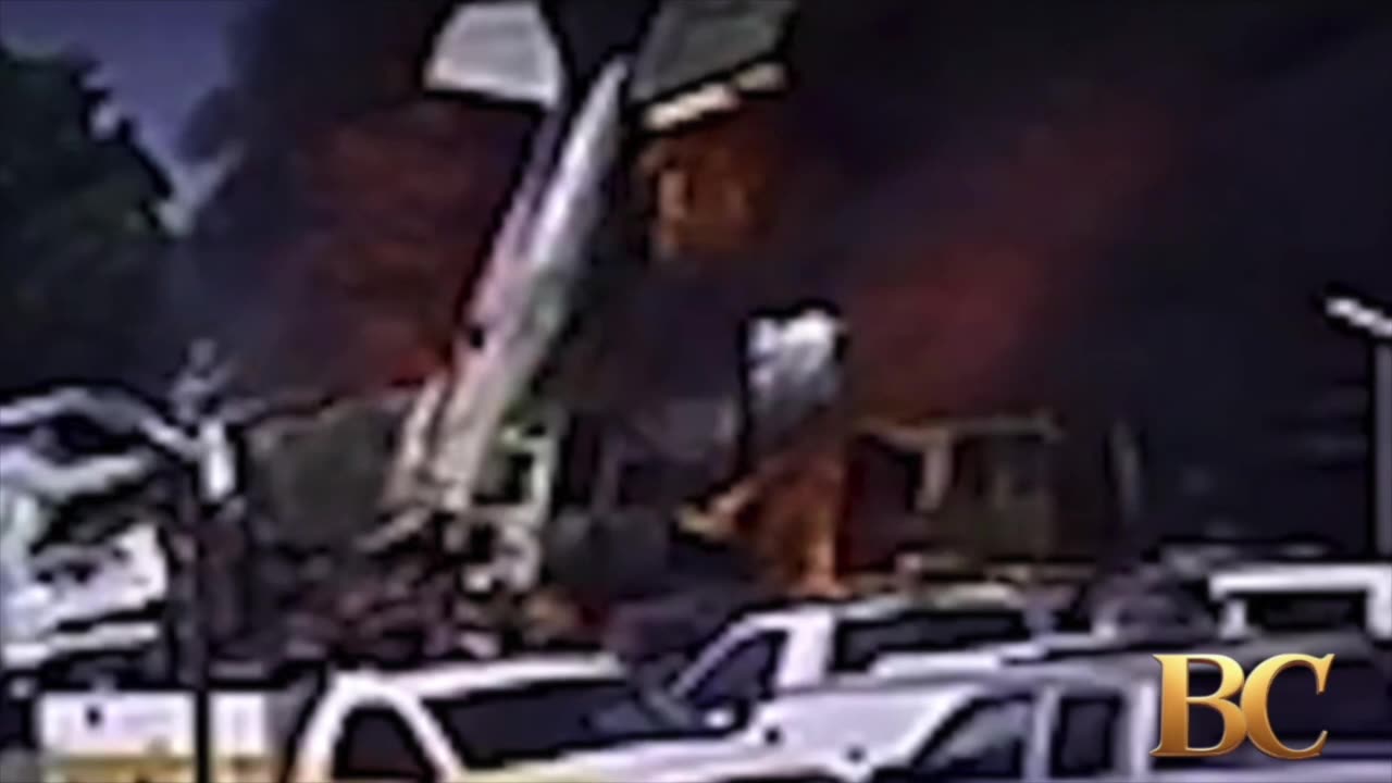 2 dead after plane crashes into 18-wheeler in fiery explosion