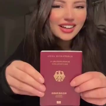 The Muslim female immigrant who obtained a German passport mocks the