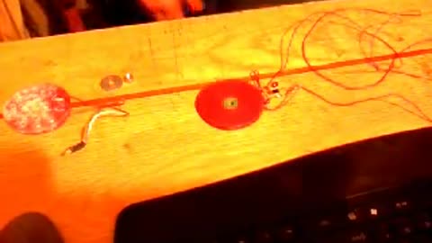 Energy transfer between two tesla bifilar pancake coils
