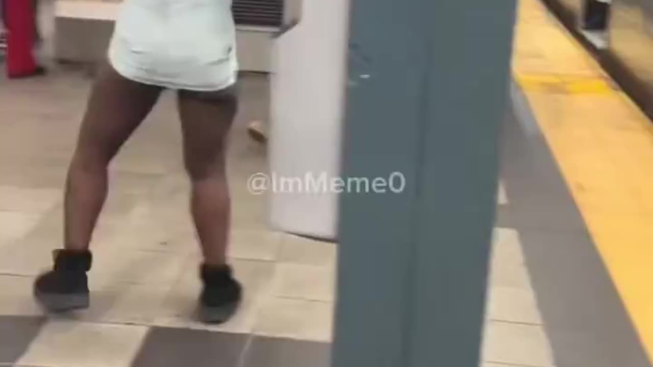 Woman with blood on her face waved knives in both hands while chasing a passenger on an NYC train.