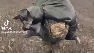 Russian Soldiers Recovering a Fallen Comrade