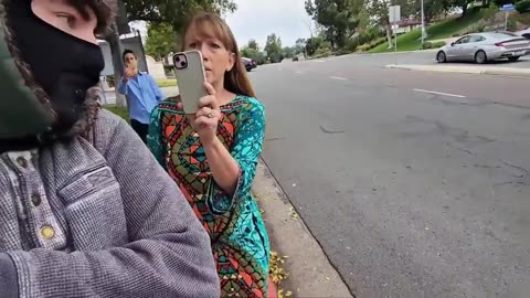 Insane people chase after a guy recording on the sidewalk