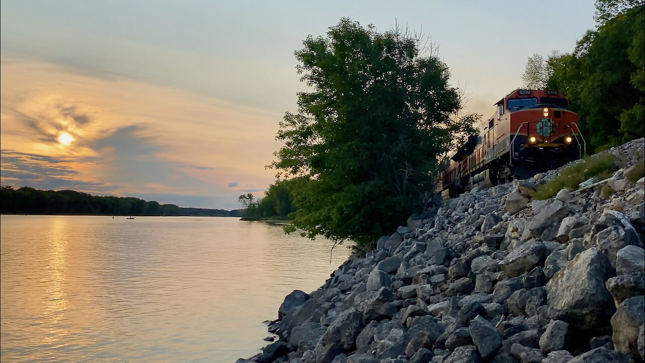 Train Rolling Past the Mississippi River