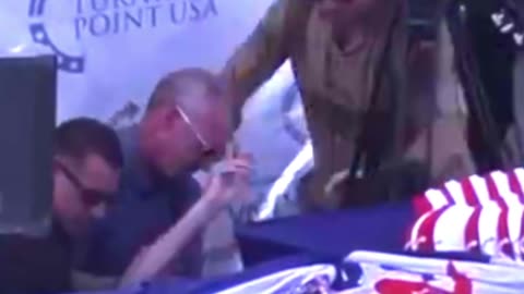 Charlie Seen Raising Hand & Pointing Up While on Ground