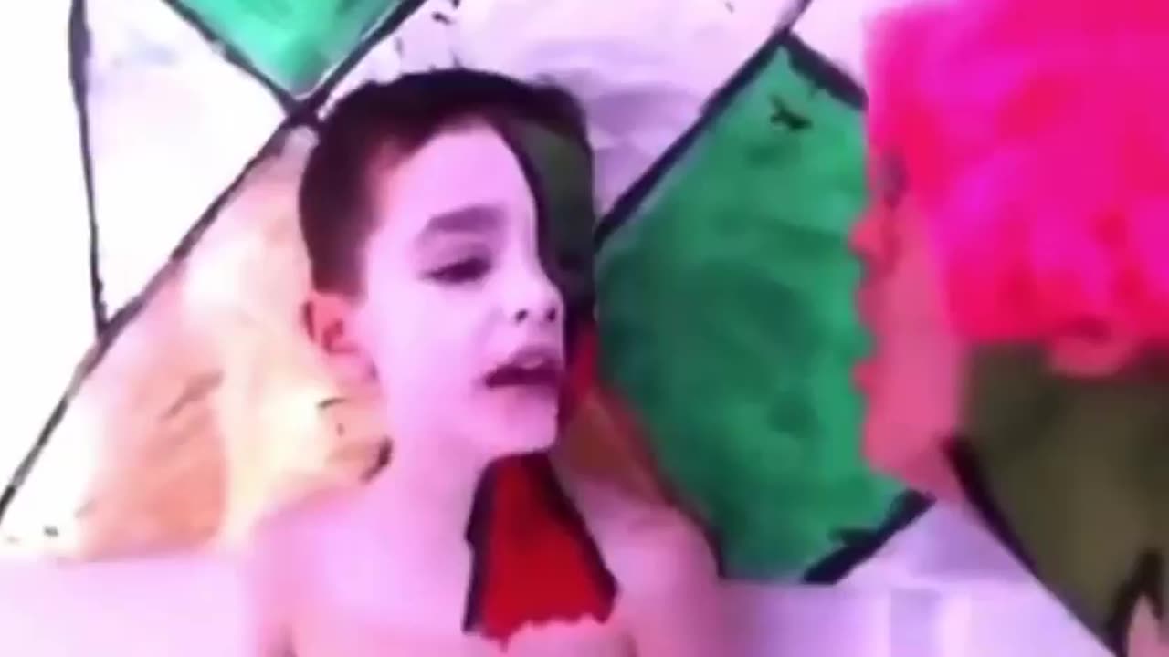 Stephen Colbert traumatizing a poor innocent child for adrenochrome