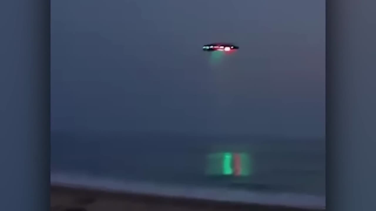 Brightly Lit Saucer over the Ocean
