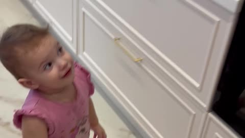 Little Girl Plays With a Snake