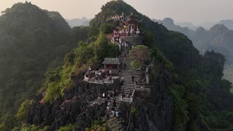 Aerial Majesty: Mua Cave Mountain Steps at Sunset