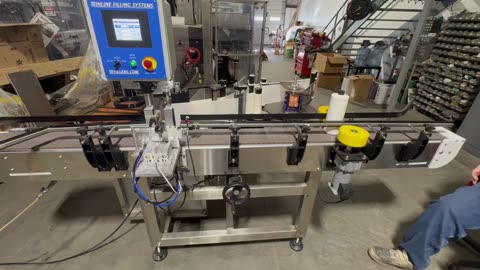 Inline Filling Systems NT Wrap Around Pressure Sensitive Labeler