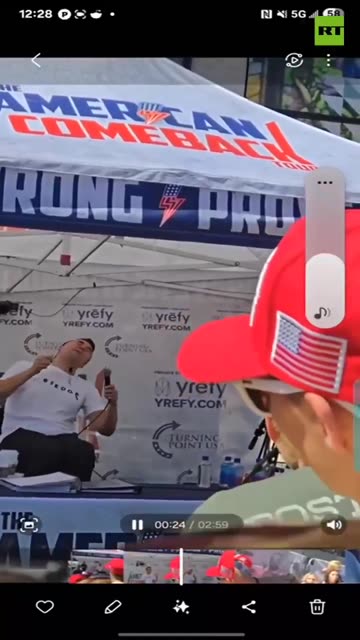 A close-up shows the moment Charlie Kirk was shot.